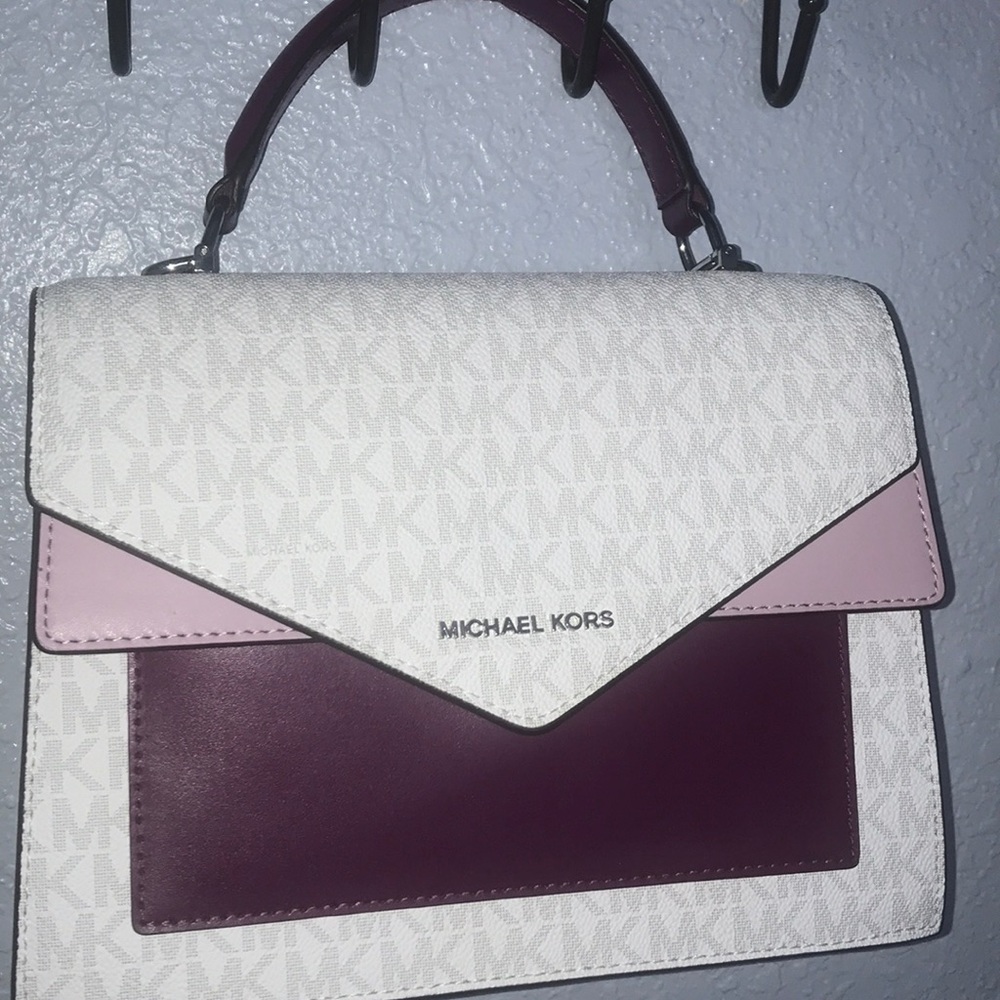 Pink Michael Kors purse.
